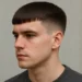 a man with french crop straight hair