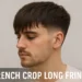 a man with french crop long fringe